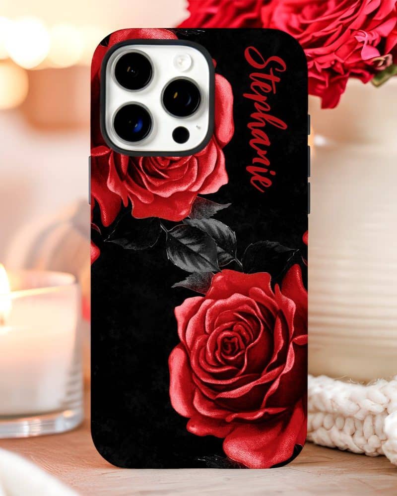Personalized phone case with red roses on a black background. The name Stephanie is printed on the case.