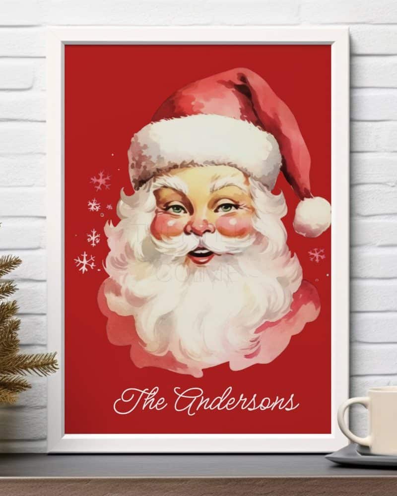 Framed illustration of Santa Claus's face against a red background, with the name Andersons at the bottom.