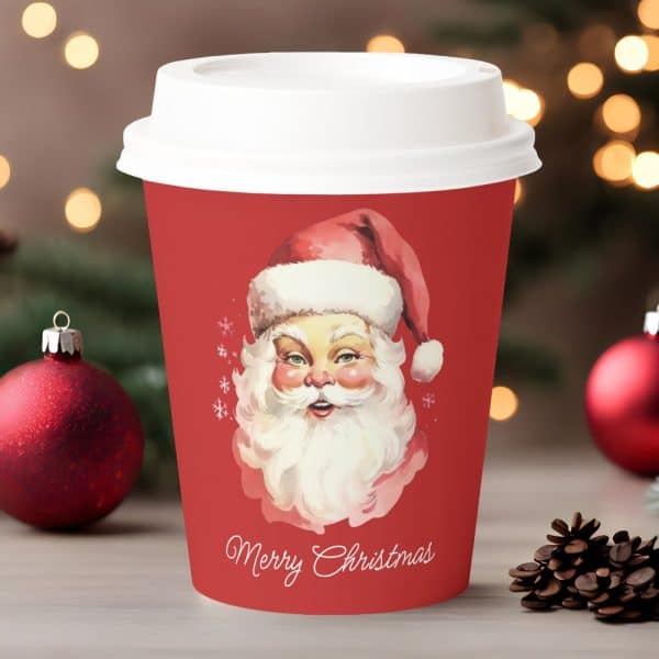 Red Christmas Coffee Cup Featuring A Vintage Santa Claus Illustration And Merry Christmas Text.