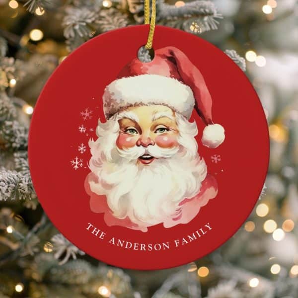 Red Christmas Ornament Featuring A Vintage Illustration Of Santa Claus'S Face, With The Text The Anderson Family Below.