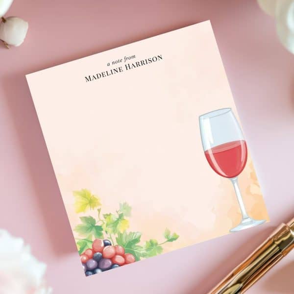 Personalized Notepad Featuring A Glass Of Red Wine And Grapes.