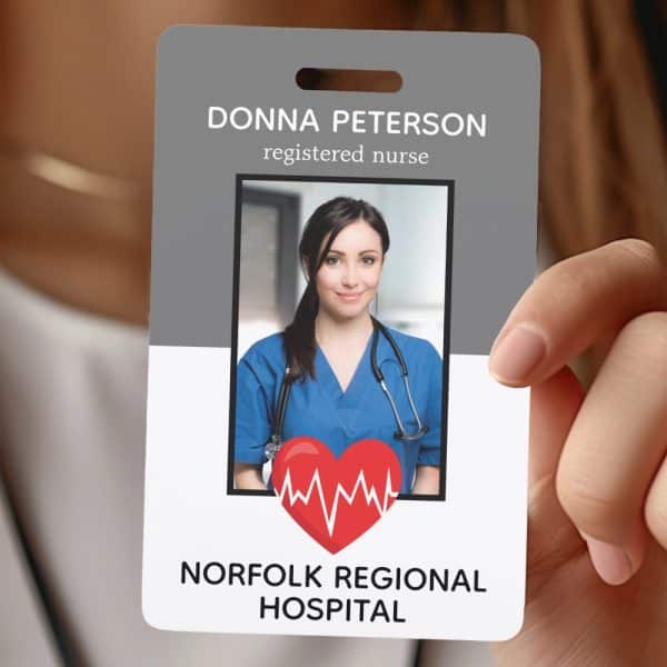 A Photo Id Badge For Donna Peterson, Registered Nurse At Norfolk Regional Hospital. A Headshot Of The Nurse Is Featured.
