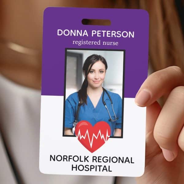 Purple Id Badge For Donna Peterson, Registered Nurse At Norfolk Regional Hospital. The Badge Includes A Photo Of The Nurse.