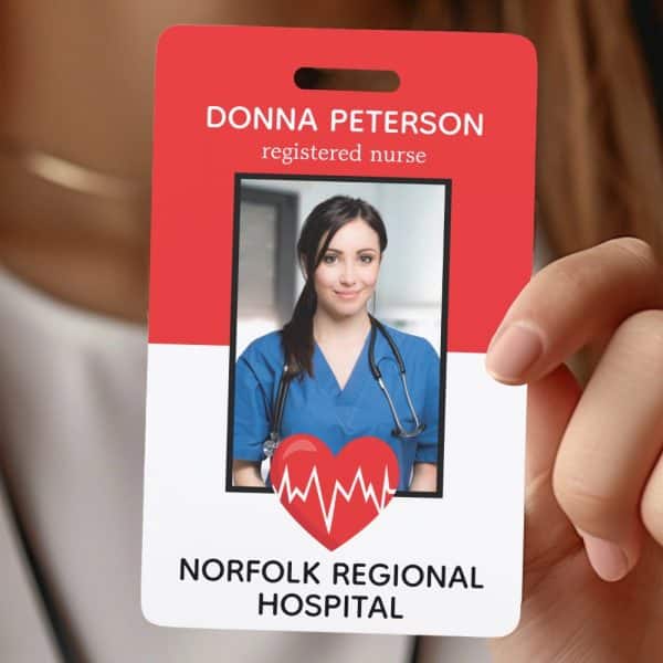 Red And White Identification Card For Donna Peterson, Registered Nurse At Norfolk Regional Hospital. A Photo Of The Nurse Is Included.