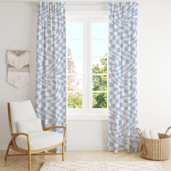 Pair Of Light Blue And Cream Wavy Checkered Curtains Hanging In A Window.
