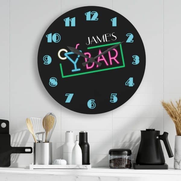 Black Round Clock With Neon-Style Bar Design And James'S Name.