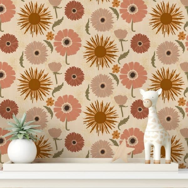 Beige Wall With A Repeating Pattern Of Stylized Orange, Peach, And Mauve Flowers, A Small Potted Plant, And A White Giraffe Toy On A Shelf.