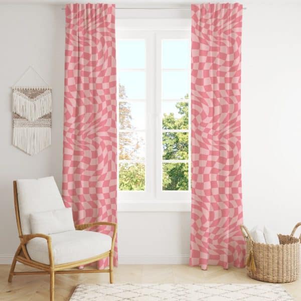 Pink Curtains With A Wavy Checkered Pattern Hang In Front Of A Window.