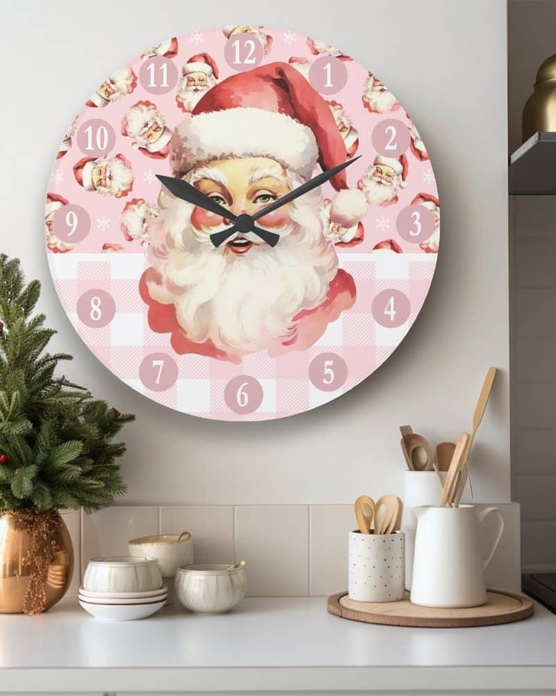 Pink and white round clock featuring a vintage Santa Claus illustration.