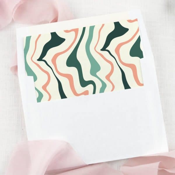 White Envelope With A Cream, Teal, And Coral Abstract Wave Pattern Liner.