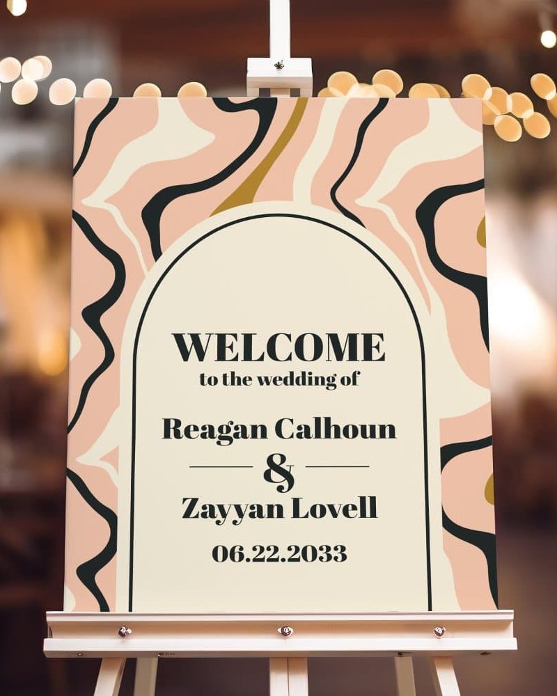 Wedding welcome sign with pink and black abstract design, announcing the wedding of Reagan Calhoun and Zayyan Lovell on June 22, 2033.