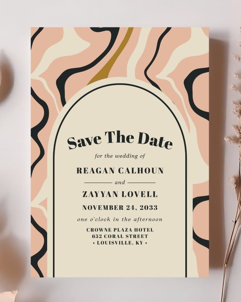 Save the date for the wedding of Reagan Calhoun and Zayyan Lovell, November 24, 2033, at Crowne Plaza Hotel in Louisville, Kentucky. The design features an abstract peach and cream marble pattern.