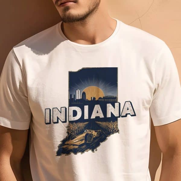 White T-Shirt Featuring A Graphic Of The Indiana State Outline, With A Cityscape, Setting Sun, Race Car, And Cornfield.
