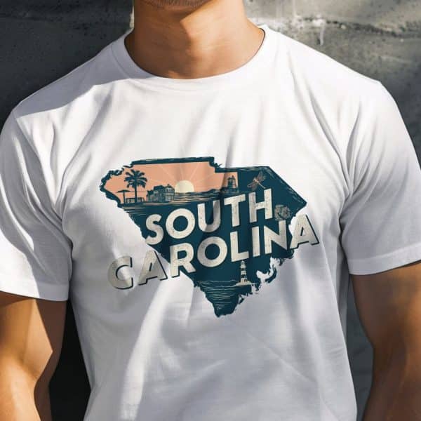 White T-Shirt With A Graphic Design Of South Carolina'S Outline, Featuring Beach Imagery And The State Name.