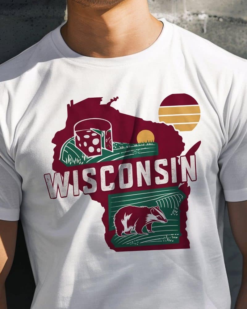White t-shirt with a maroon Wisconsin state outline graphic featuring a badger, cheese, and a stylized sun.