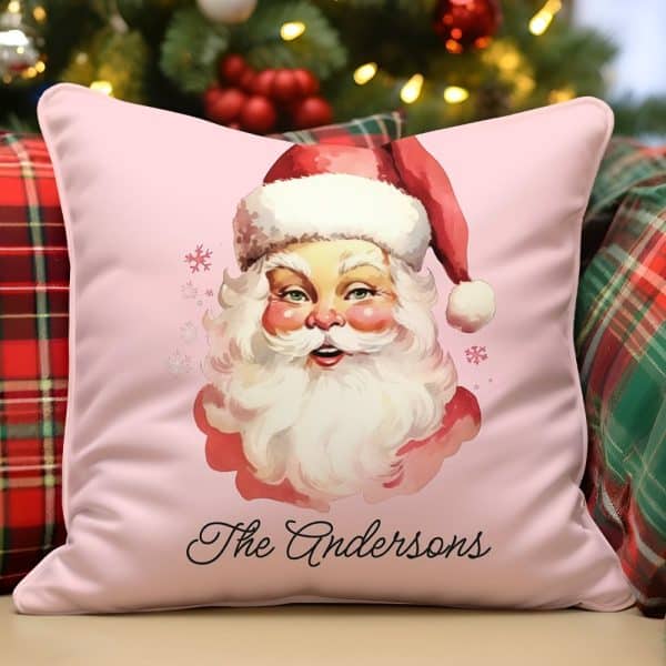 Pink Pillow With A Vintage Illustration Of Santa Claus And The Name Andersons.