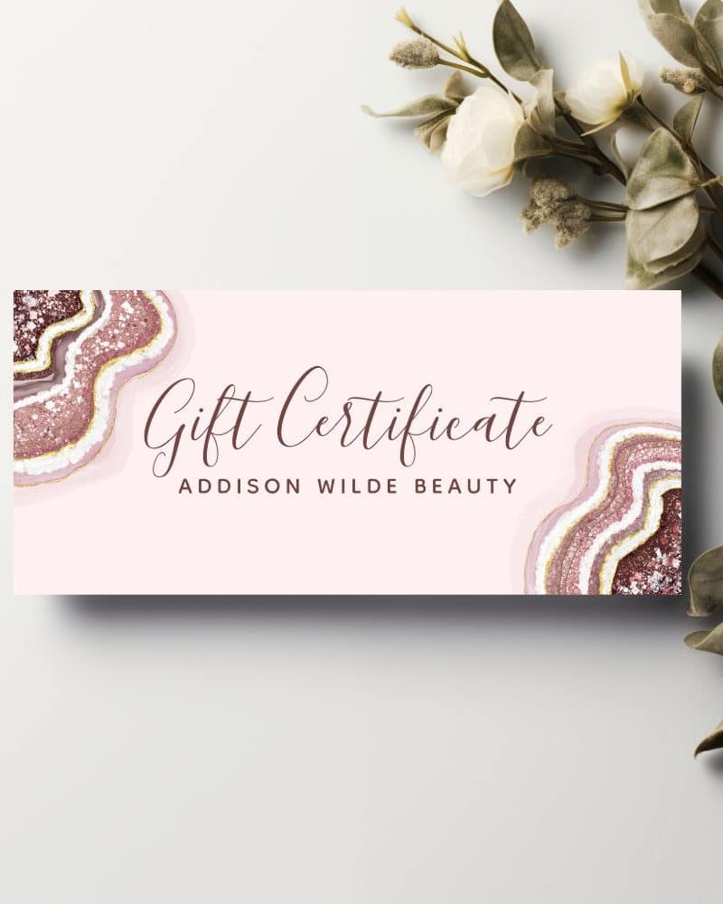 Pink gift certificate for Addison Wilde Beauty, featuring a rose gold and pink agate design.