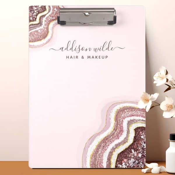 Pink Clipboard With Addison Wilde Hair &Amp; Makeup Logo; Features A Rose Gold And White Agate Design.