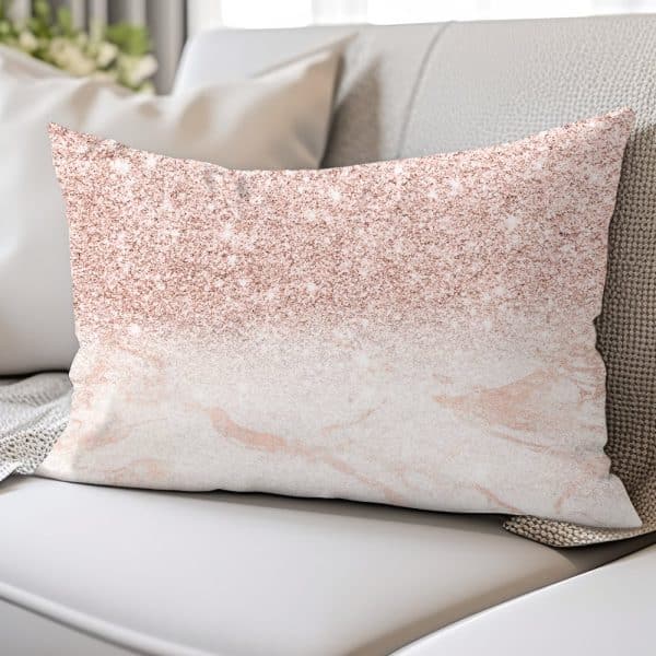 Rose Gold Glitter Ombre Throw Pillow On A White Couch.