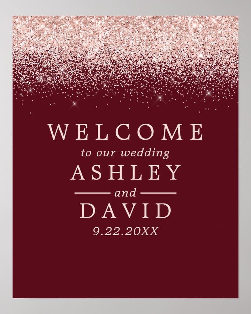 Wedding welcome sign with rose gold glitter on a burgundy background announcing Ashley and David's wedding date.