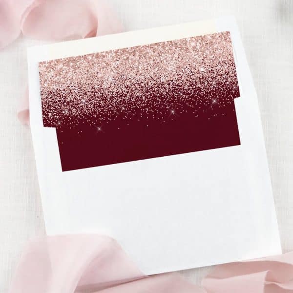 White Envelope Liner With A Burgundy And Rose Gold Glitter Design.