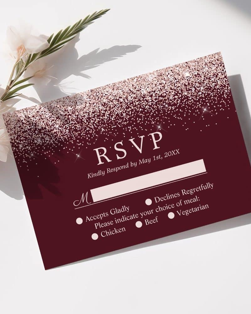 Burgundy RSVP card with rose gold glitter, requesting response by May 1st.
