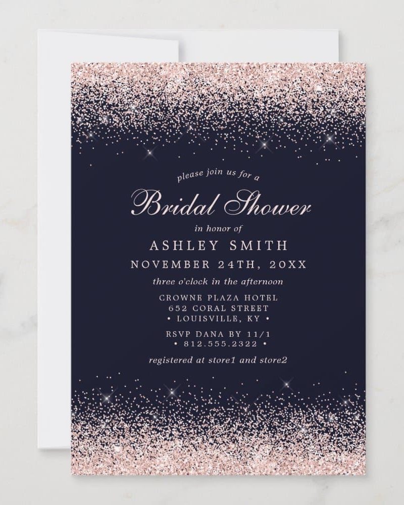 A dark blue bridal shower invitation with rose gold glitter at the top and bottom. The invitation includes the bride's name and shower details.
