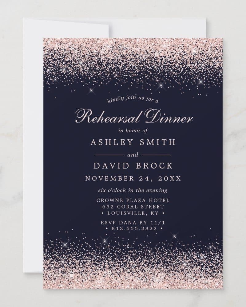 Rehearsal dinner invitation for Ashley Smith and David Brock, November 24th, at the Crowne Plaza Hotel in Louisville, KY. Rose gold glitter accents a navy blue background.