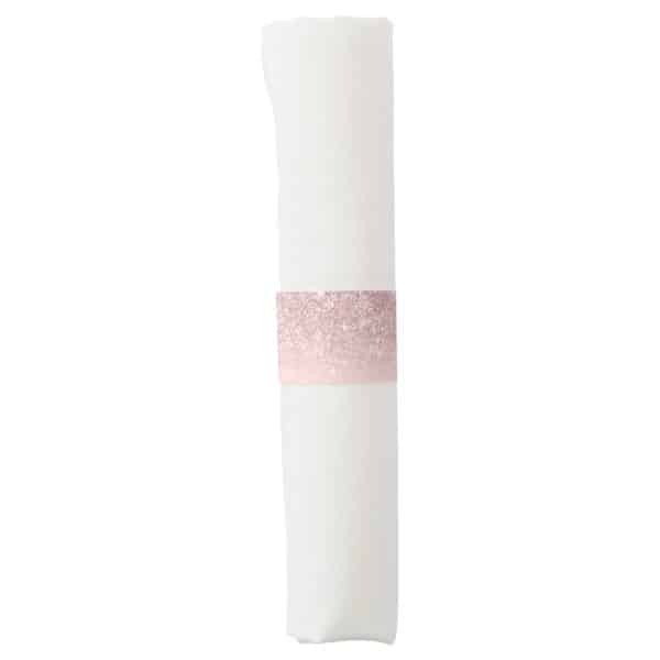 White Napkin With A Rose Gold Glitter Napkin Ring.
