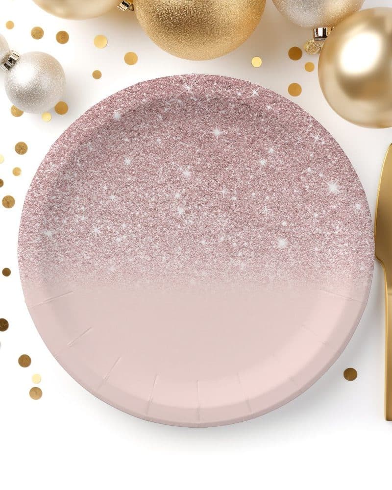 Rose gold glitter ombre paper plate with gold cutlery.