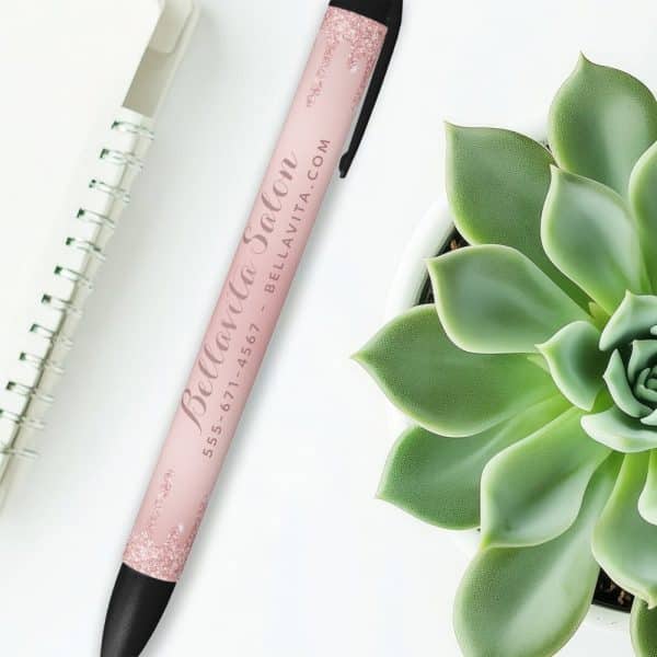 Pink Pen With Bella Vita Salon Logo And Contact Information.