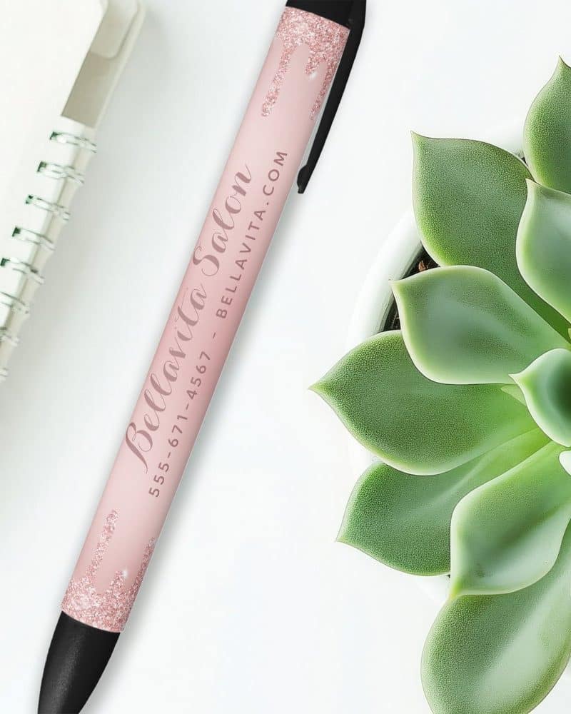 Pink pen with Bella Vita Salon logo and contact information.