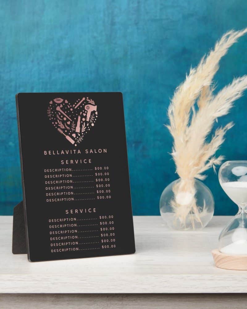 Black salon price list with rose gold heart logo and service descriptions.