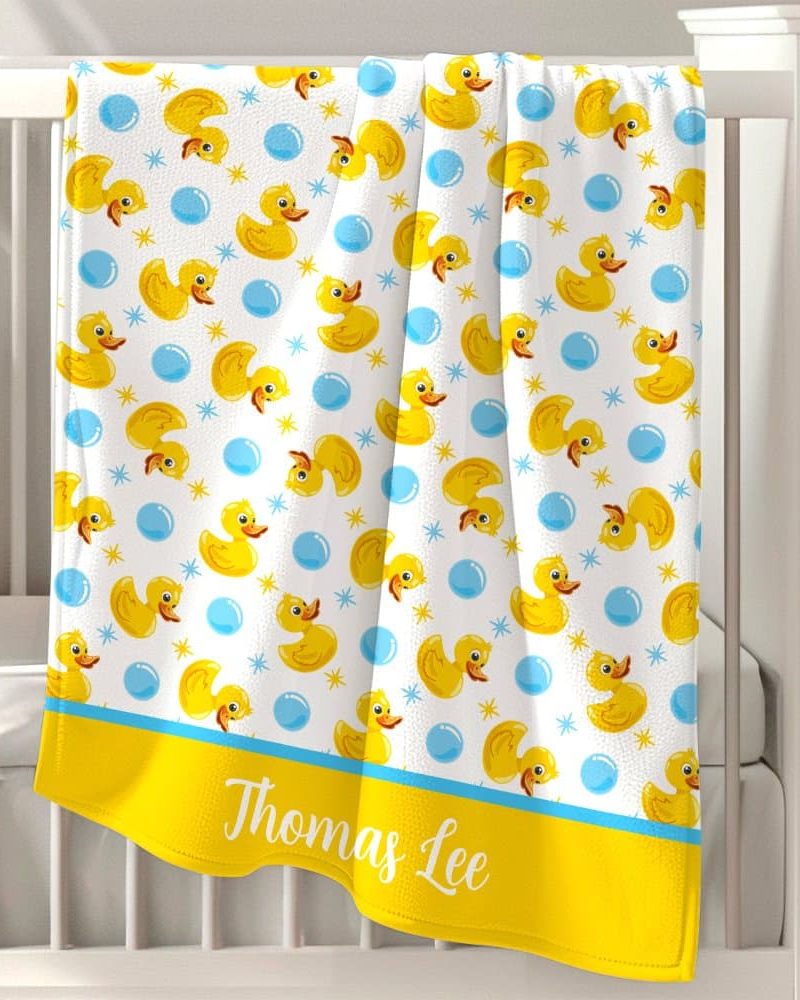 Personalized baby blanket with a yellow rubber ducky and bubble pattern.