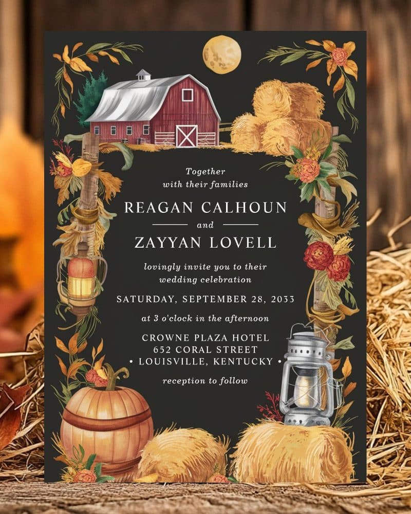 Autumnal wedding invitation featuring a red barn, hay bales, pumpkins, and lanterns. The names Reagan Calhoun and Zayyan Lovell are prominently displayed.