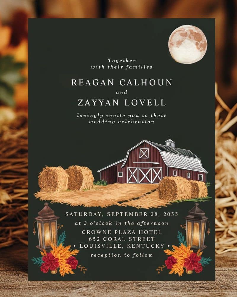 Wedding invitation with a rustic barn, hay bales, and lanterns.
