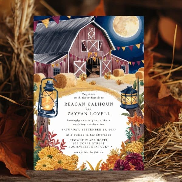 Wedding Invitation Featuring A Watercolor Painting Of A Red Barn At Night Under A Full Moon.