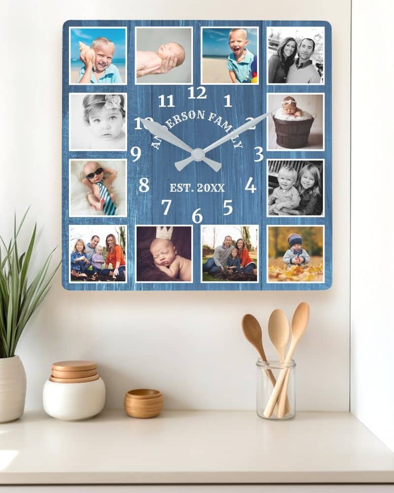 A blue square wall clock featuring twelve family photos arranged in a grid. The clock face includes the family name and establishment year.
