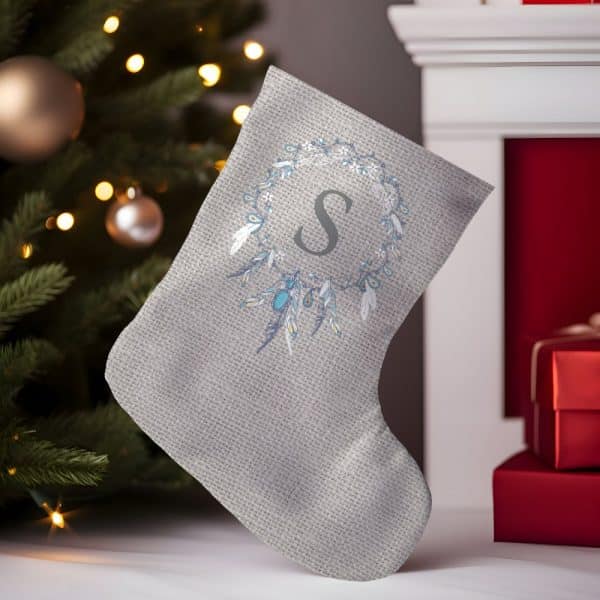 Gray Christmas Stocking With A Feather And Jewel Design And The Initial S.