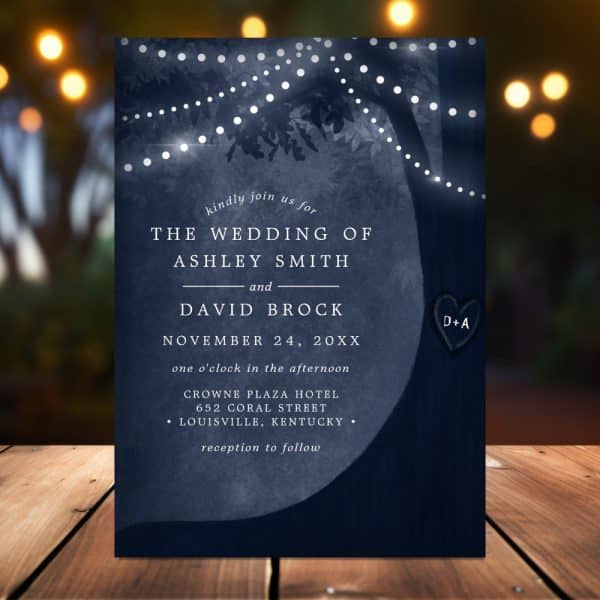 Navy Blue Wedding Invitation With A Silhouetted Tree And String Lights; Ashley Smith And David Brock'S Wedding Details Are Printed On It.