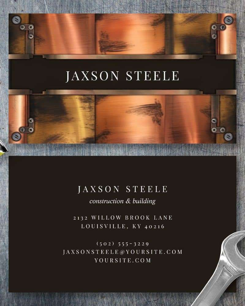 Jaxson Steele construction and building business card with a metallic copper design.