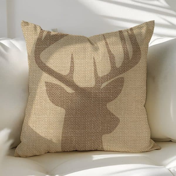 Beige Burlap Throw Pillow With A Brown Deer Silhouette.