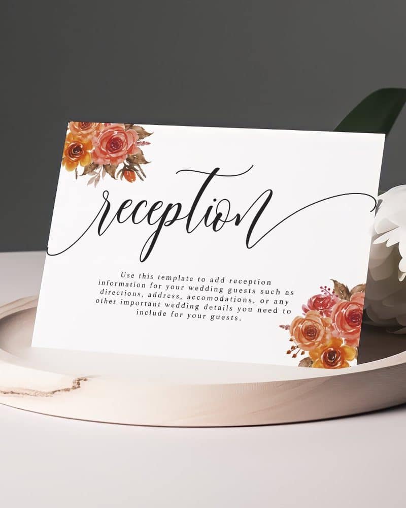 Wedding reception information card with floral design.
