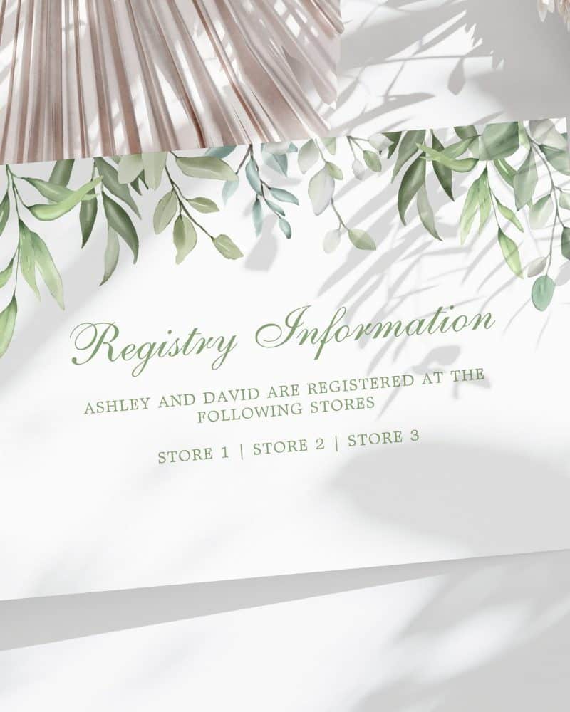 Wedding registry information card with green leaf design, listing Ashley and David's registry locations.