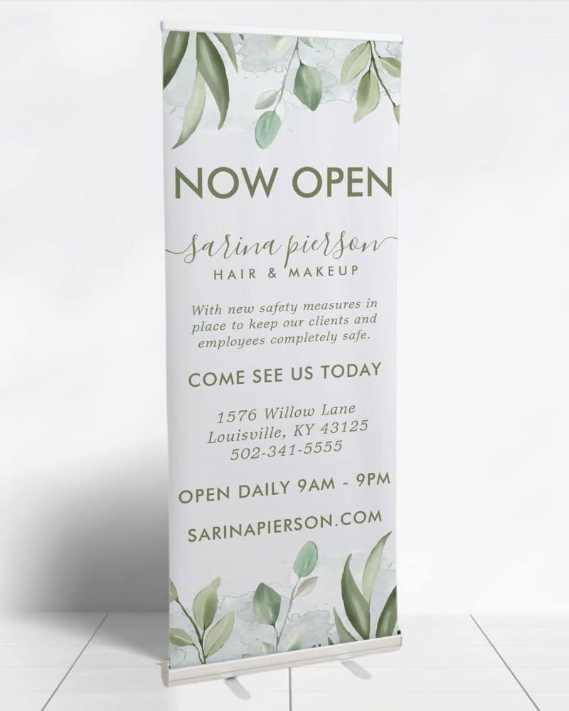 A Now Open sign for Sarina Pierson Hair & Makeup, featuring a watercolor floral design.