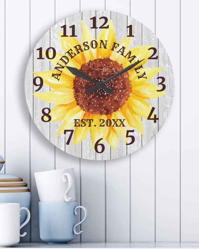 Round sunflower clock with Anderson family name and established year.
