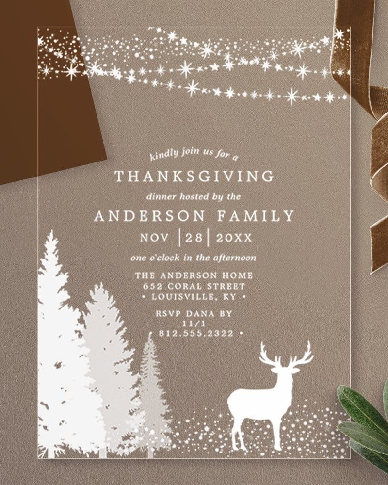 Thanksgiving invitation featuring a deer and pine trees in a snowy scene.