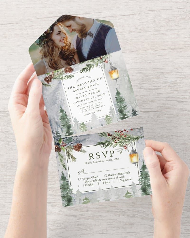 Winter wedding invitation with a photo of the couple and RSVP card.