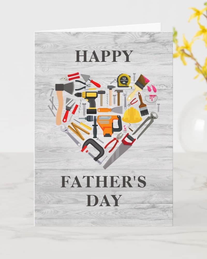 Happy Father's Day card featuring a heart shape made of various tools.