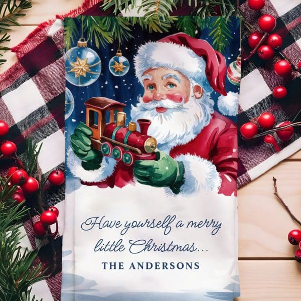 Santa Claus Holding A Toy Train.